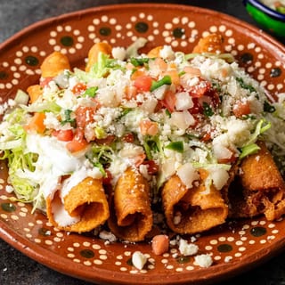 HH Roll Taquitos bite Pollo